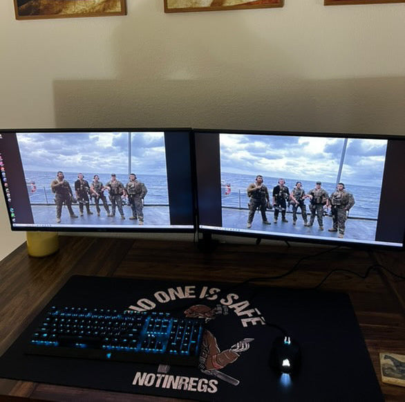 No One Is Safe Desk Mat